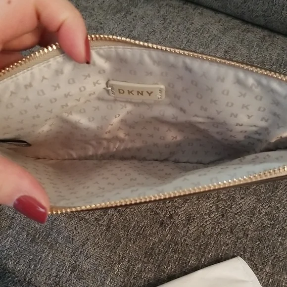 Nwt DKNY medium brown graffiti wristlet. Retails $78 - Picture 5 of 8